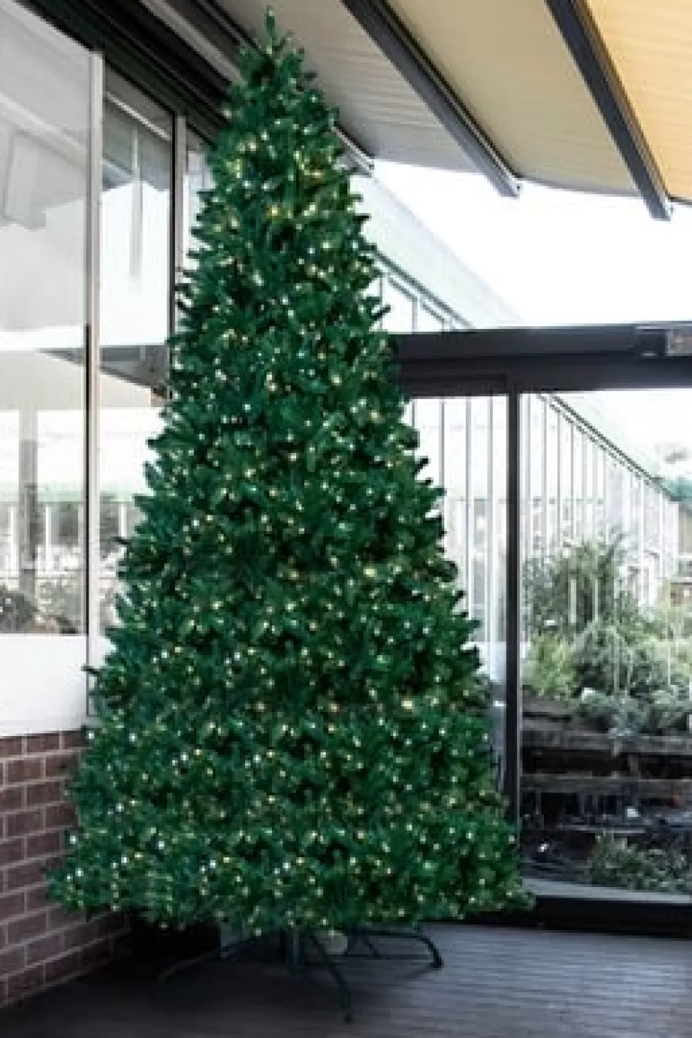Christmas Tree World The 10ft Pre-lit Ultra Devonshire Tree - 4.6ft Wide - Warm White/Bright White Colour Change Lights< Large Commercial Christmas Trees | 10 Foot Pre Lit Christmas Trees