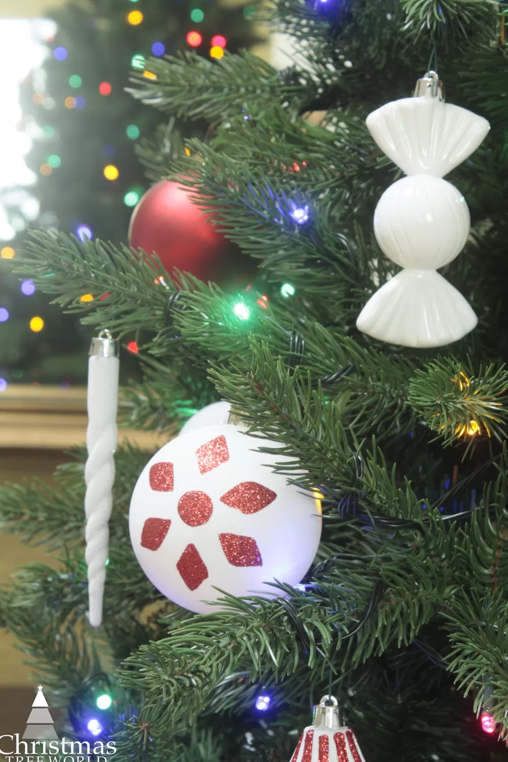 Christmas Tree World The 12ft Ultra Devonshire Fir Pre-lit With Warm White/Multicoloured Colour Change LEDs - NI/IE< Large & Giant Artificial Christmas Trees Ireland | Large & Giant Christmas Trees In Northern Ireland